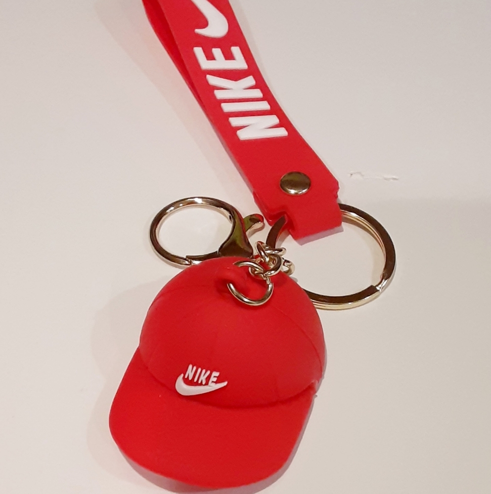 Nike Red Keychain with Cap Design